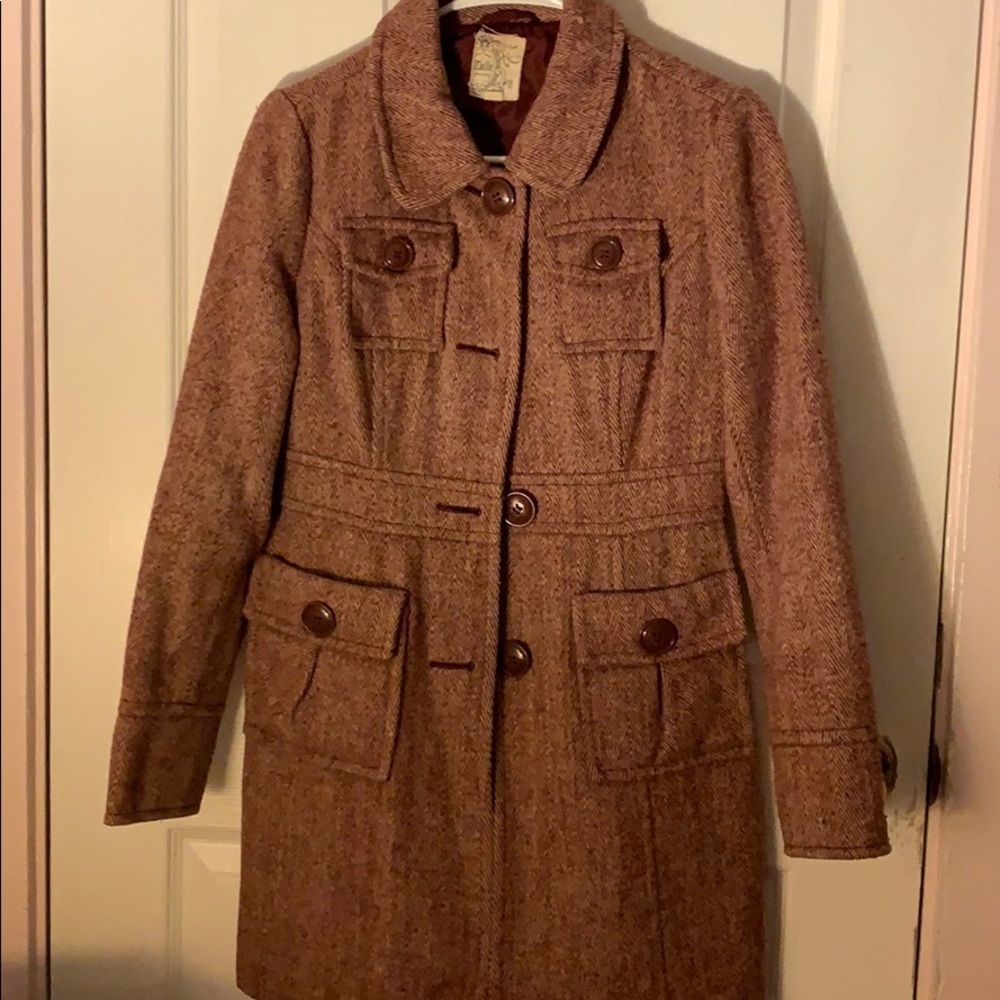 Pink winter coat. In fair condition
